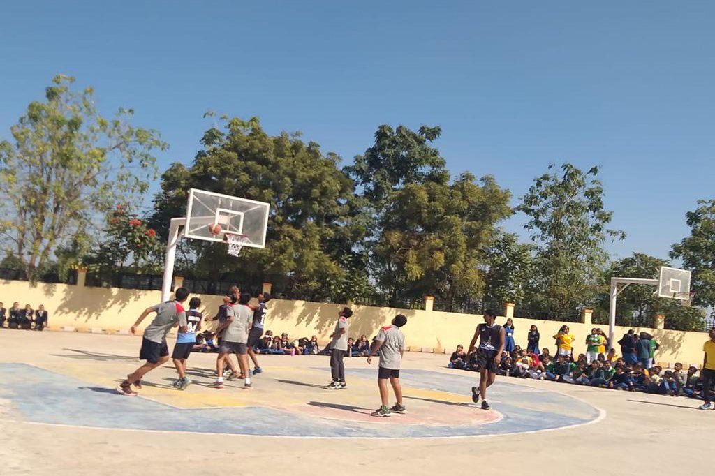 Students playing basketball at Atma Malik Sports School